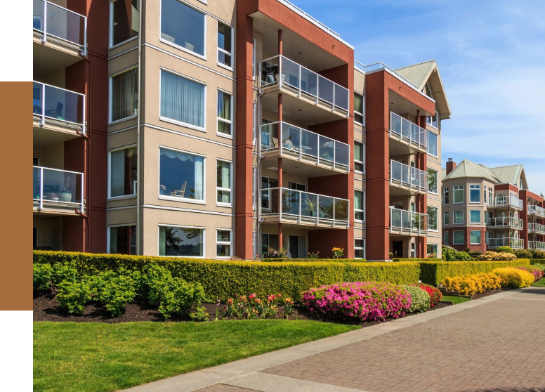 A building with flowers in front of it